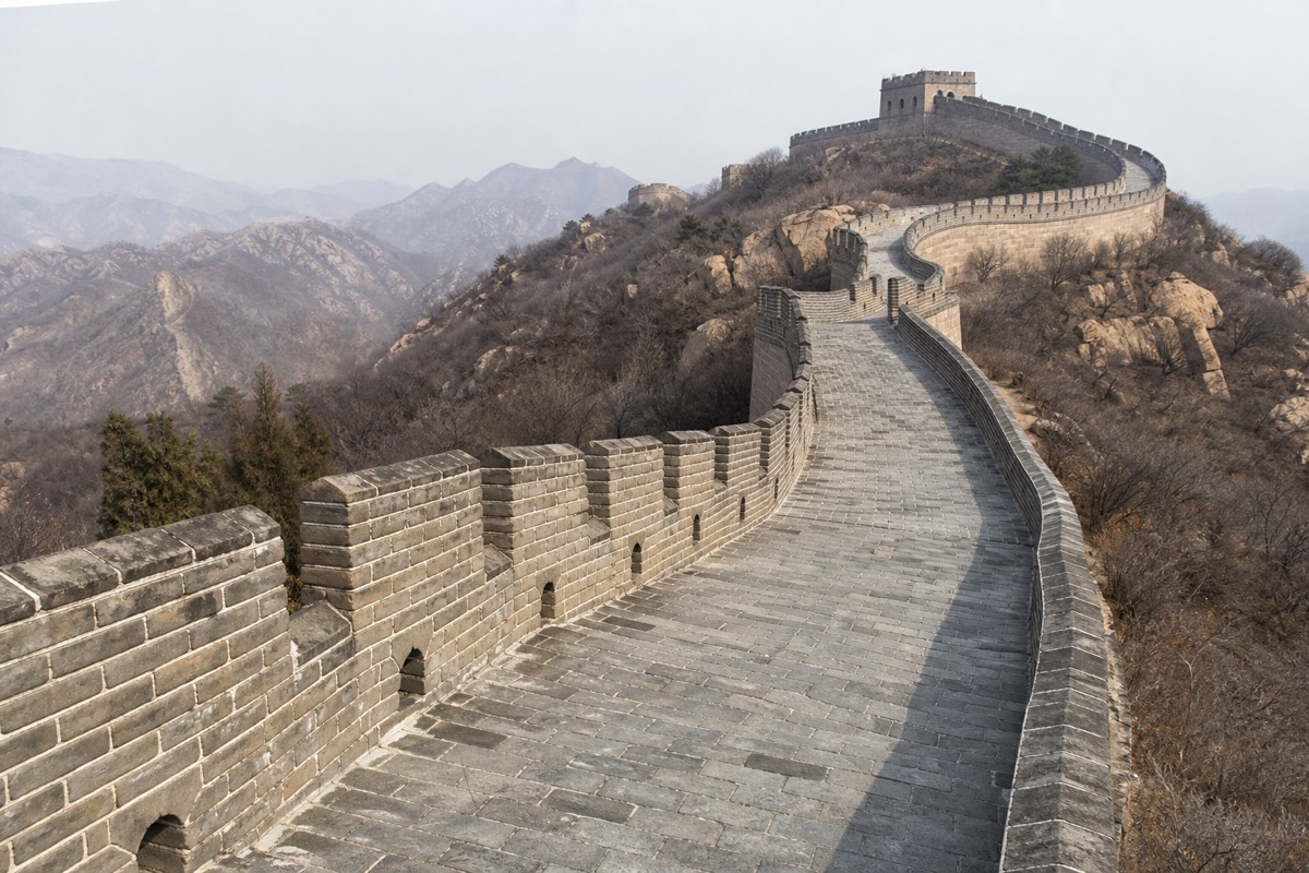 Broad restored ramparts compared with the weathered Jinshanling Great Wall