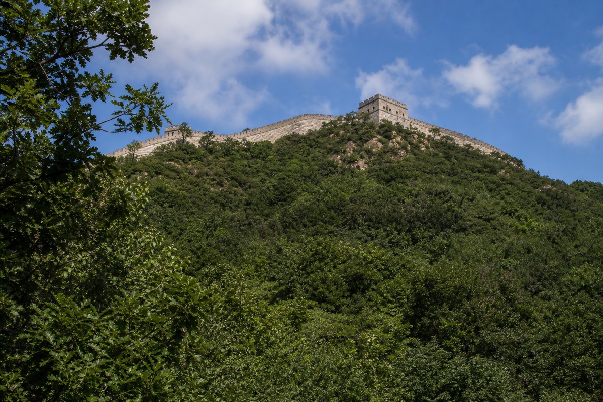 The restored Great Wall at Mutianyu, where Great Wall ticket prices are posted at the gate